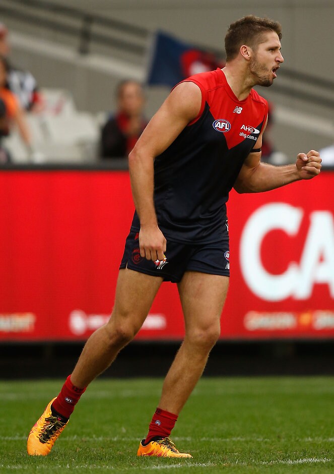 AFL 2016 Rd 01 - Melbourne v GWS Giants MELBOURNE, AUSTRALIA - MARCH 26: Jesse Hogan of the Demons celebrates a goal during the 2016 AFL Round 01 match between the Melbourne Demons and the GWS Giants at the Melbourne Cricket Ground, Melbourne on March 26, 2016. (Photo by Sean Garnsworthy/AFL Media)